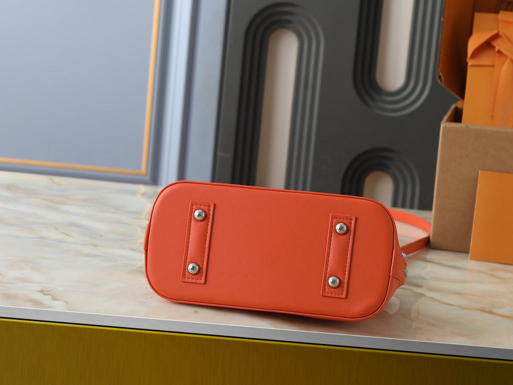 Louis Vuitton Alma BB Domed Top-Handle Bag — detail