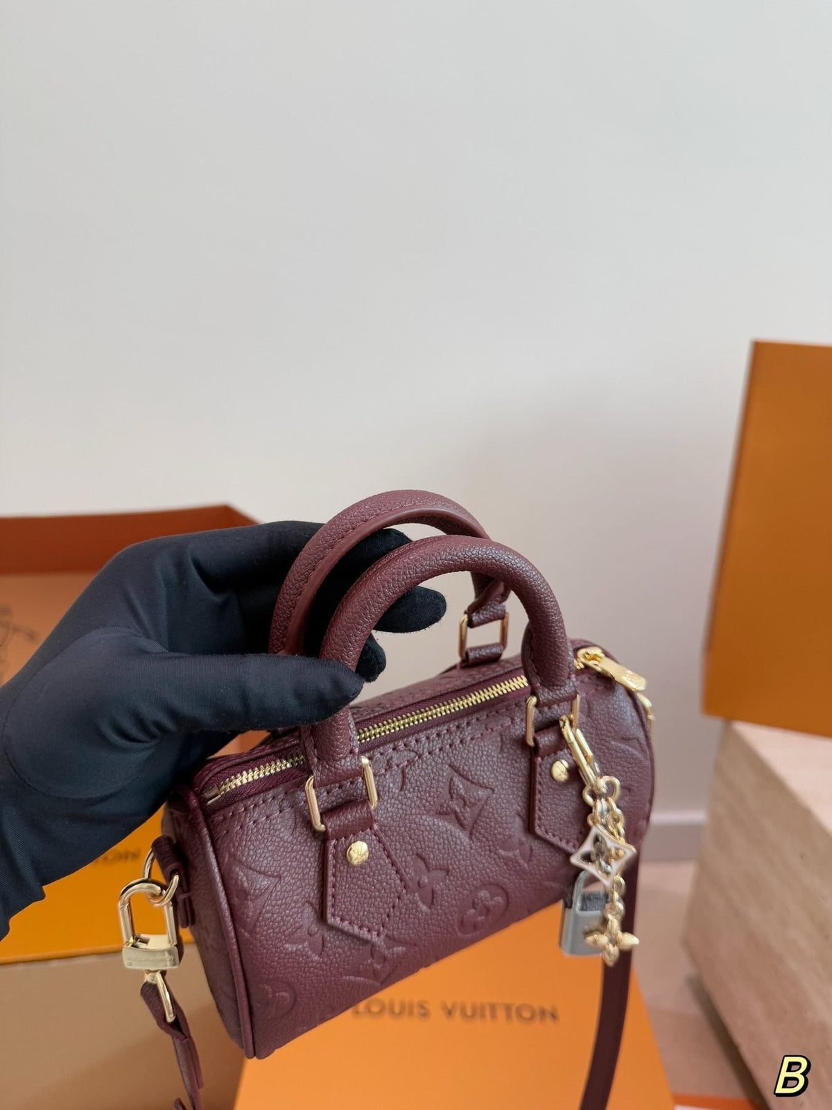 Louis Vuitton Speedy Nano Burgundy Monogram Empreinte Bag — model
