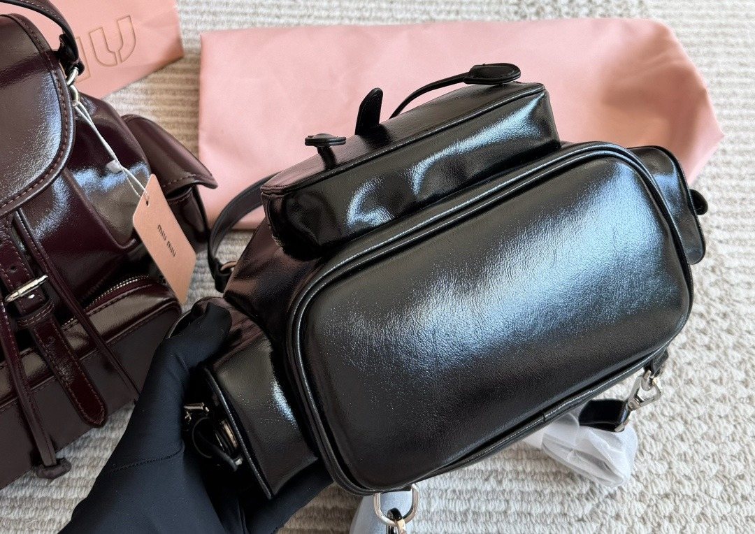 Miu Miu Buckle-Flap Pocket Backpack — detail