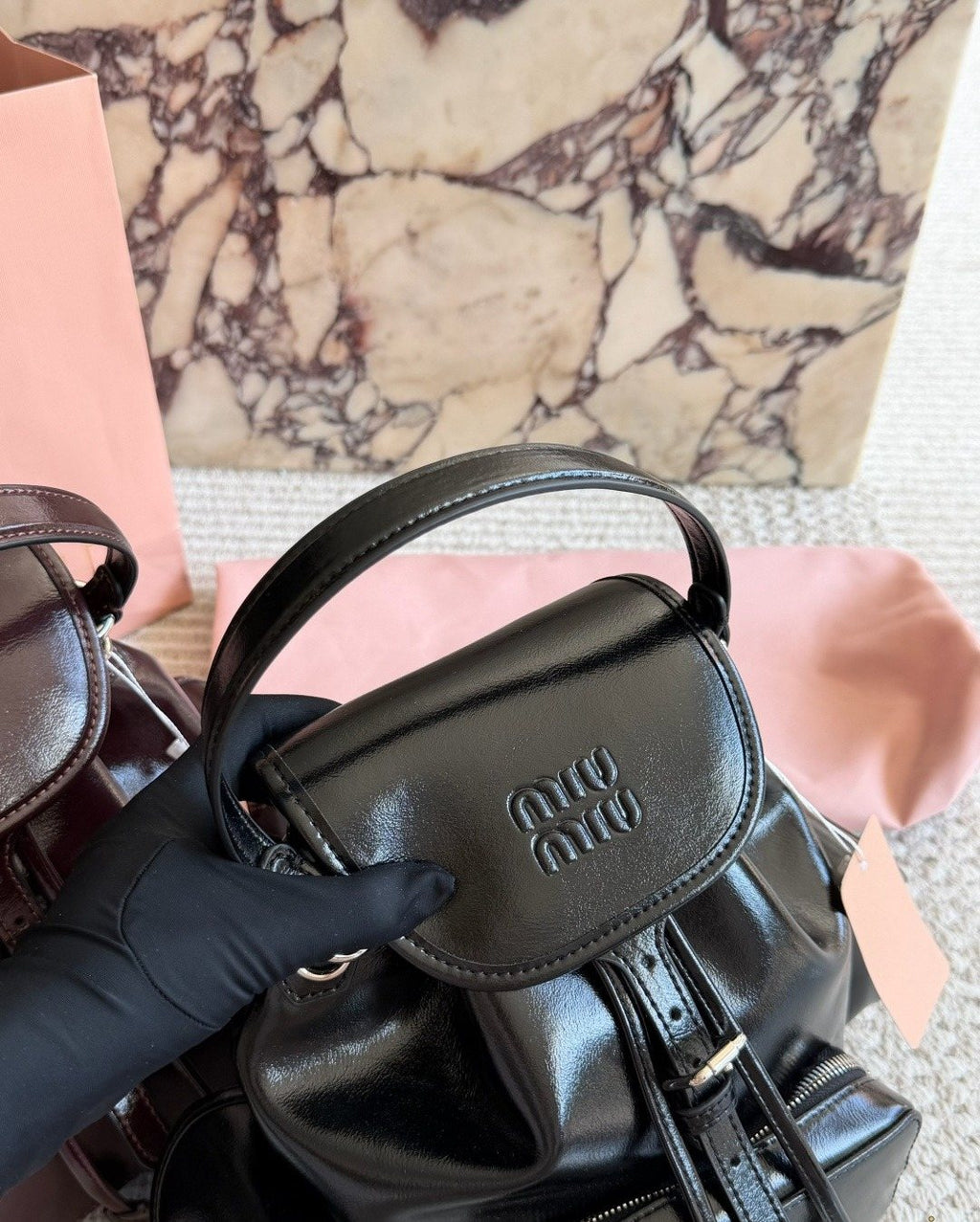 Miu Miu Buckle-Flap Pocket Backpack — detail