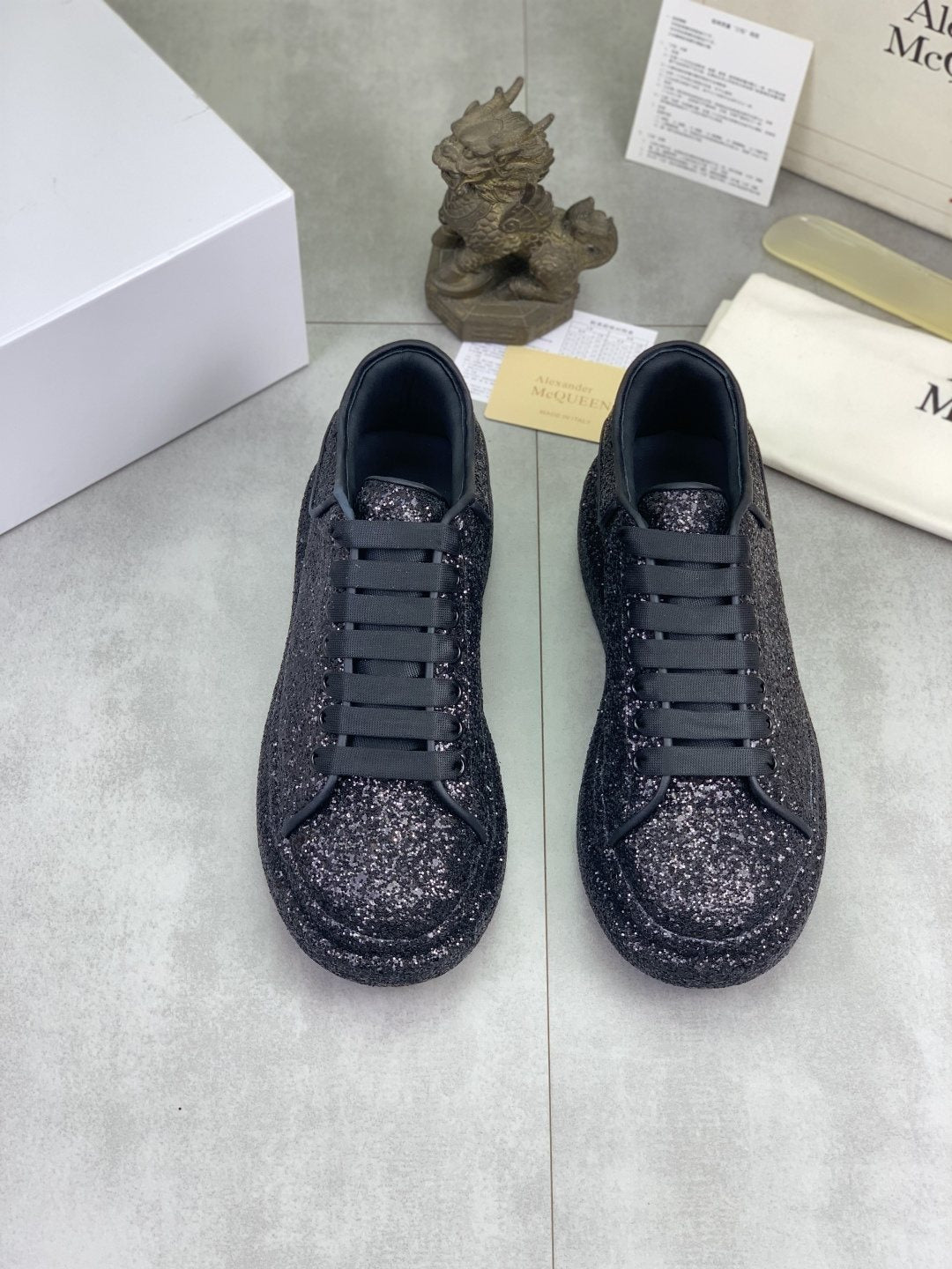 Alexander McQueen Black Glitter Low-Top Sneakers — hero