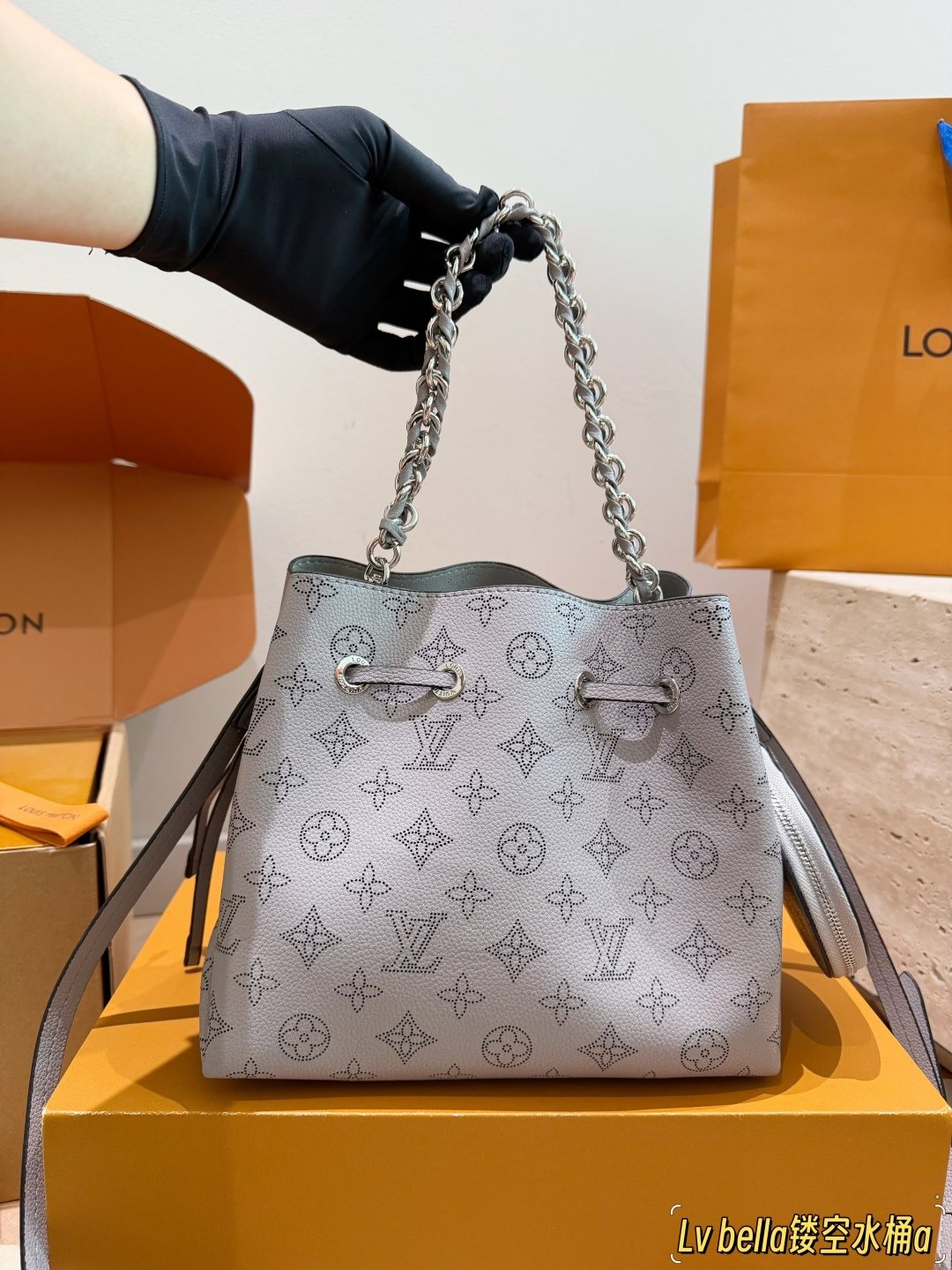 Louis Vuitton Bella Monogram Bucket Bag — model