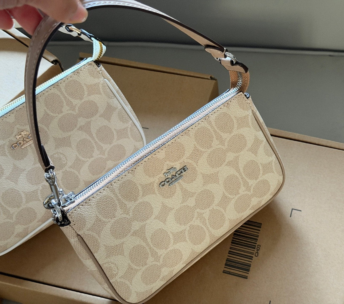 Coach Nolita Zip-Top Shoulder Bag — comparison