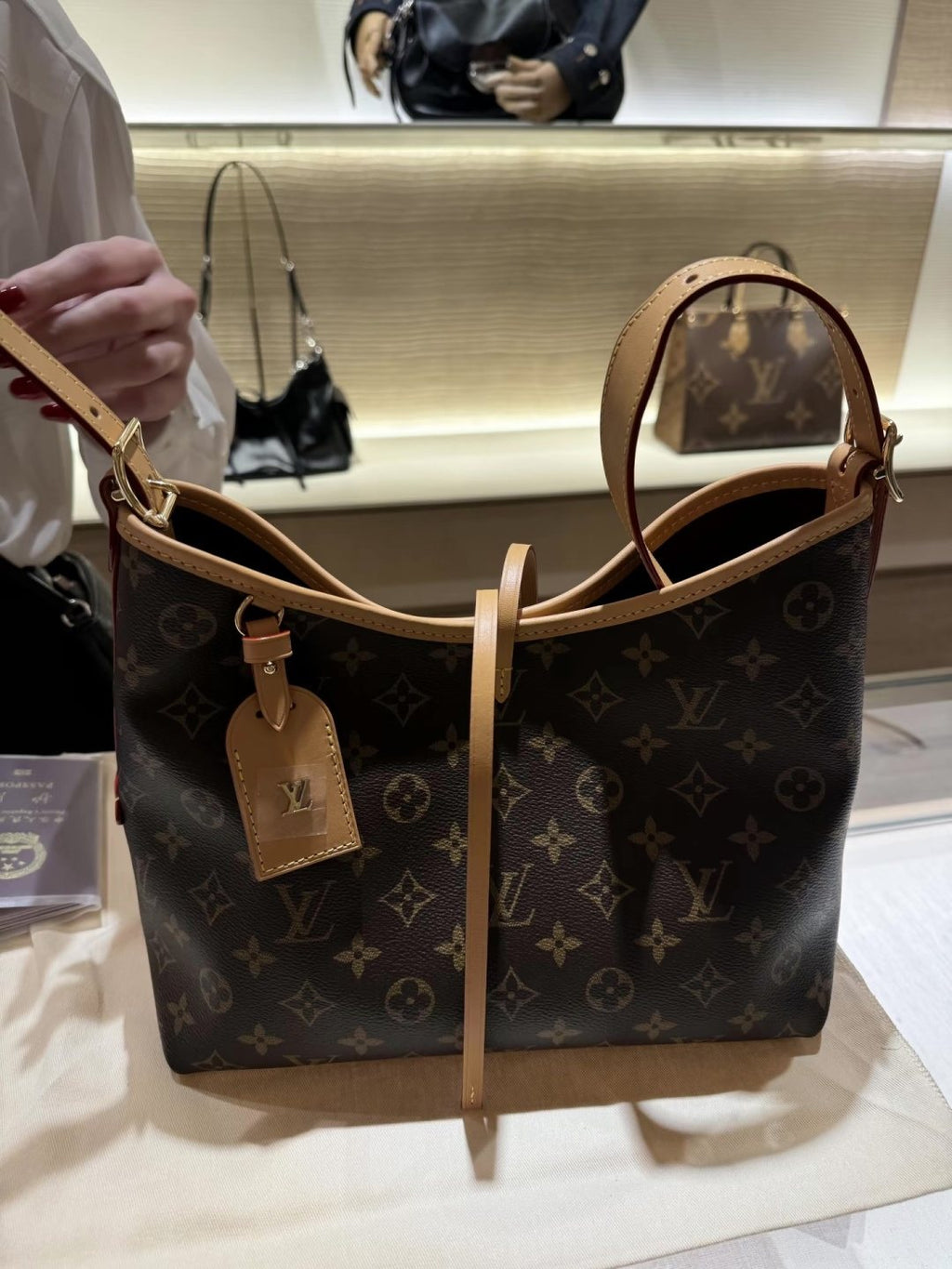 Louis Vuitton Carryall Monogram Shoulder Bag — hero