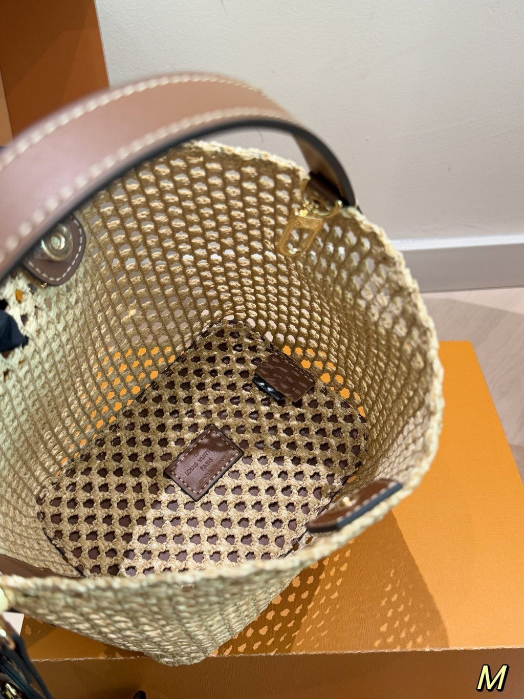 Louis Vuitton Woven Bucket Bag with Monogram Pouch — detail