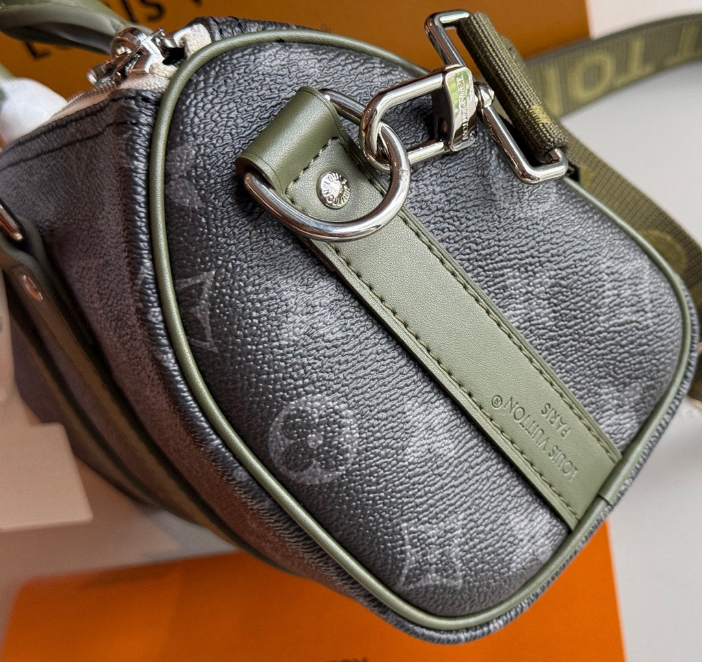 Louis Vuitton Keepall Monogram Duffel Bag with Olive Trim — detail