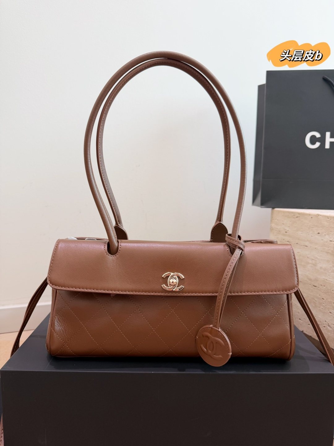 Chanel Quilted Baguette Shoulder Bag — front