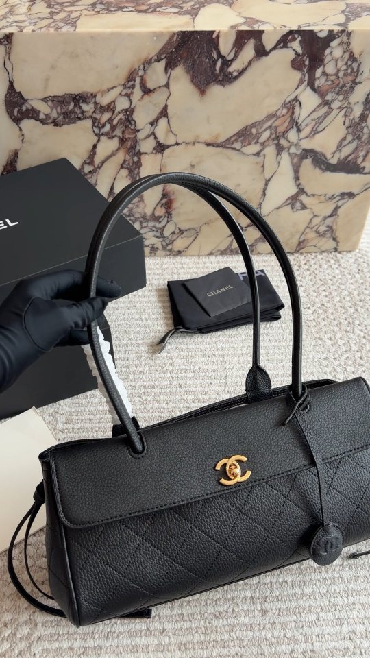 Chanel Quilted Baguette Shoulder Bag — hero