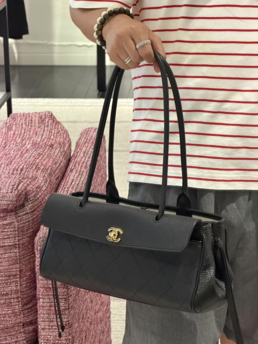 Chanel Quilted Baguette Shoulder Bag — model