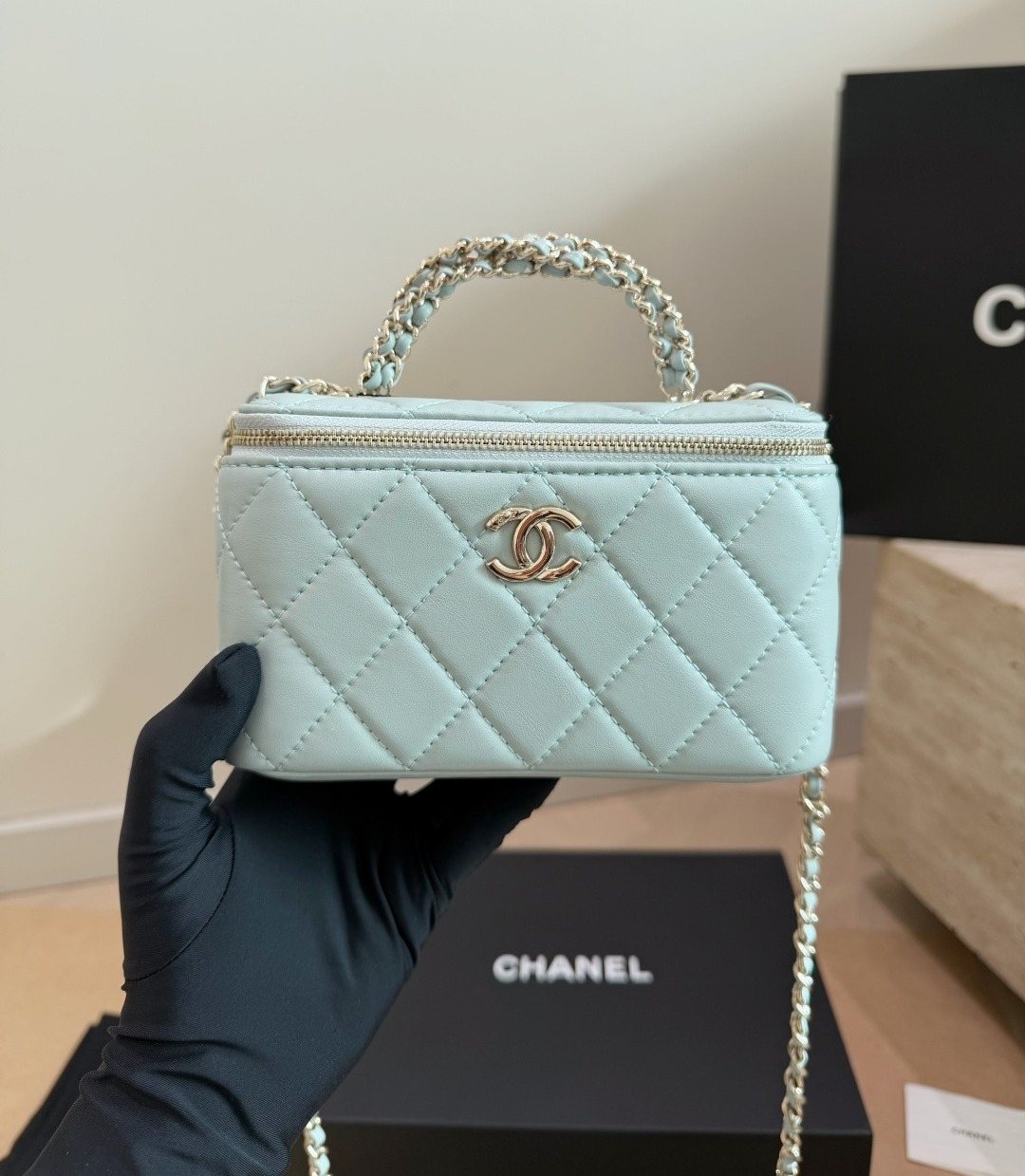Chanel Quilted Top-Handle Box Bag — model