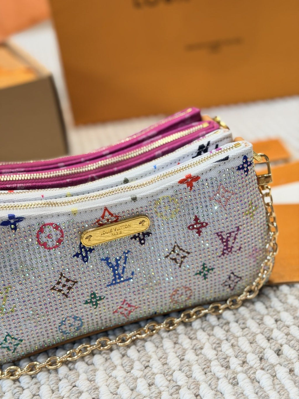 Louis Vuitton Monogram Zip-Top Pouch Shoulder Bag — comparison