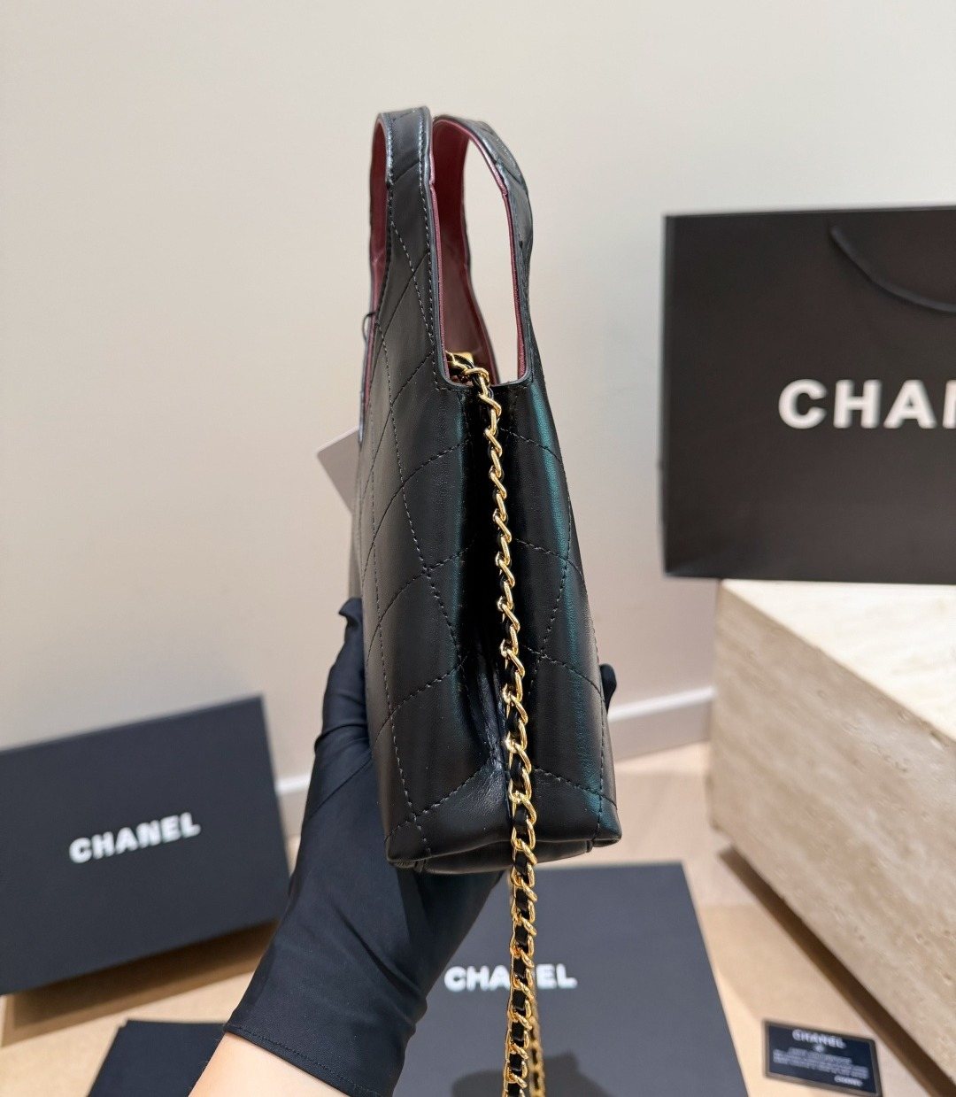 Chanel Diamond-Quilted Integrated-Handle Hobo Bag — side