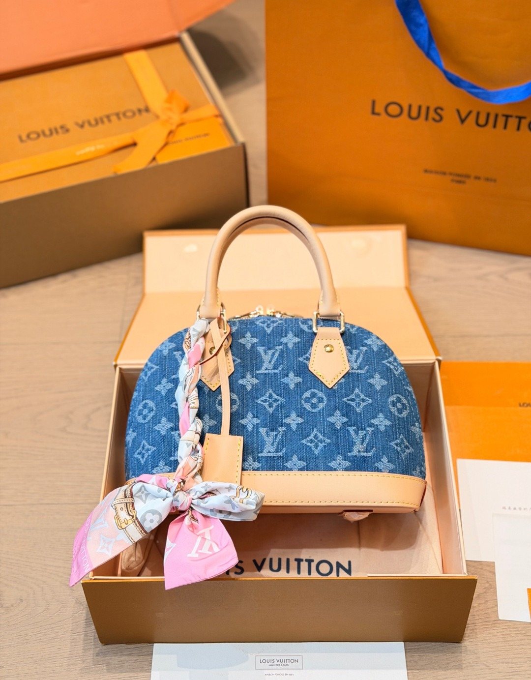 Louis Vuitton Alma BB Monogram Denim Handbag — front