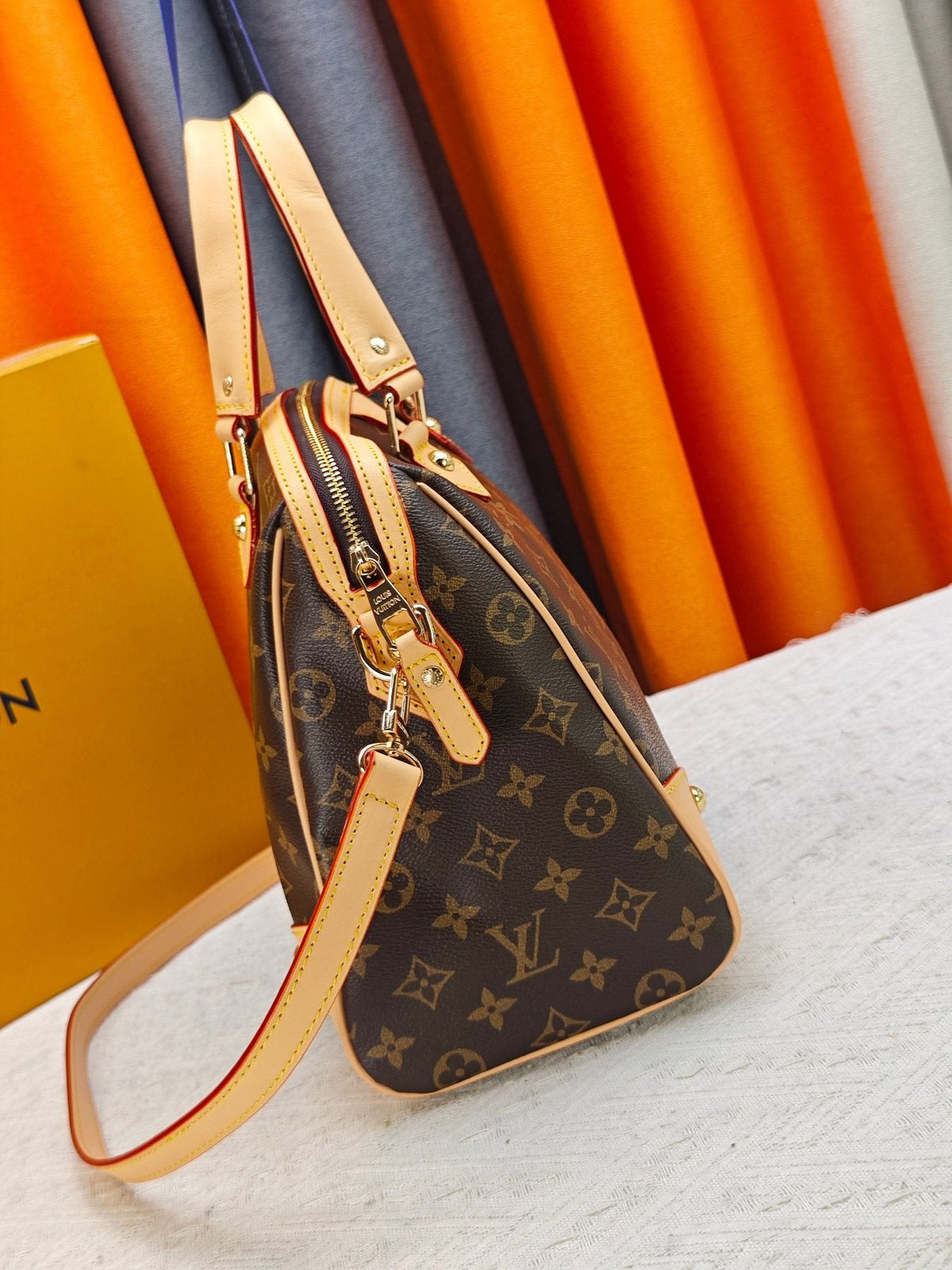 Louis Vuitton Retiro Monogram Handbag — side