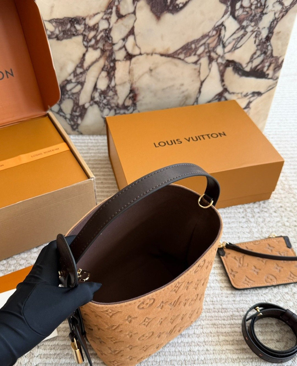 Louis Vuitton Tan Embossed Monogram Bucket Bag — detail