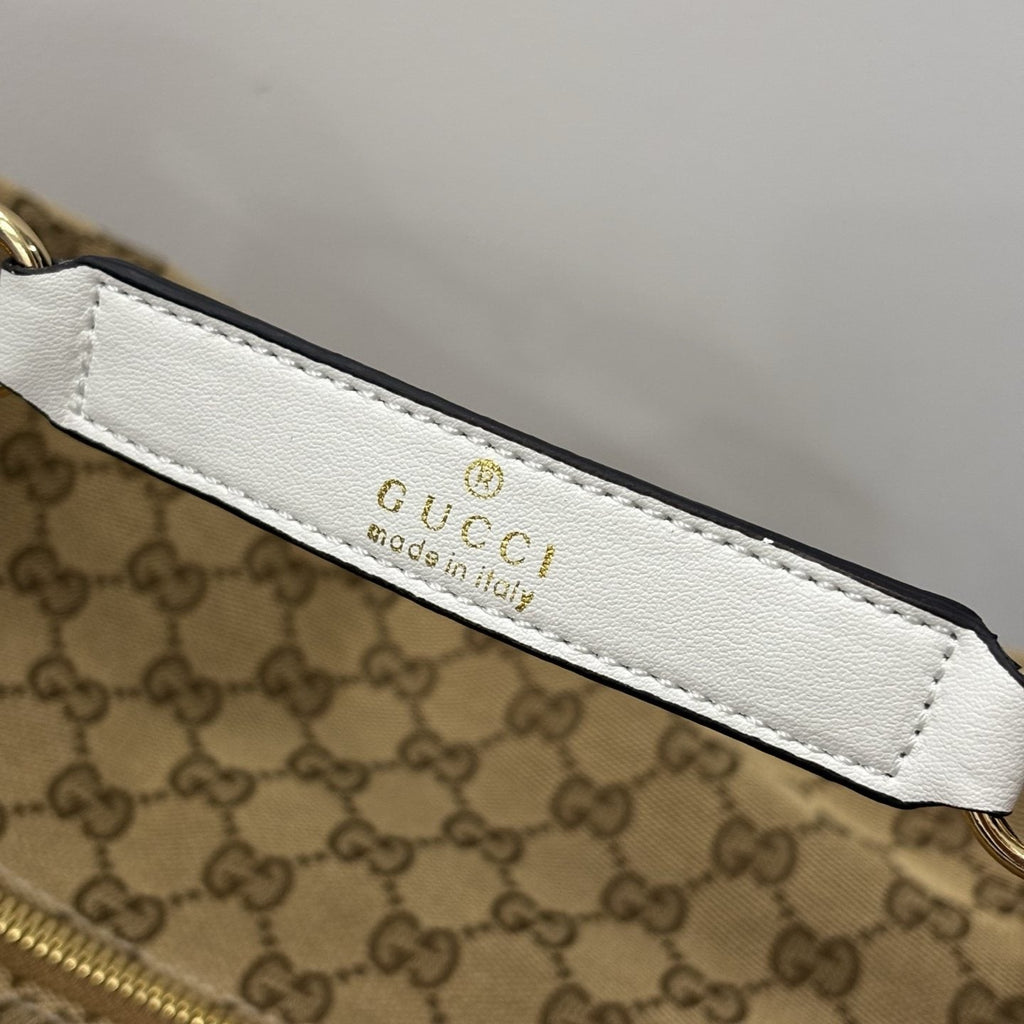 Gucci Curved-Pocket Linked-Handle Shoulder Bag — detail