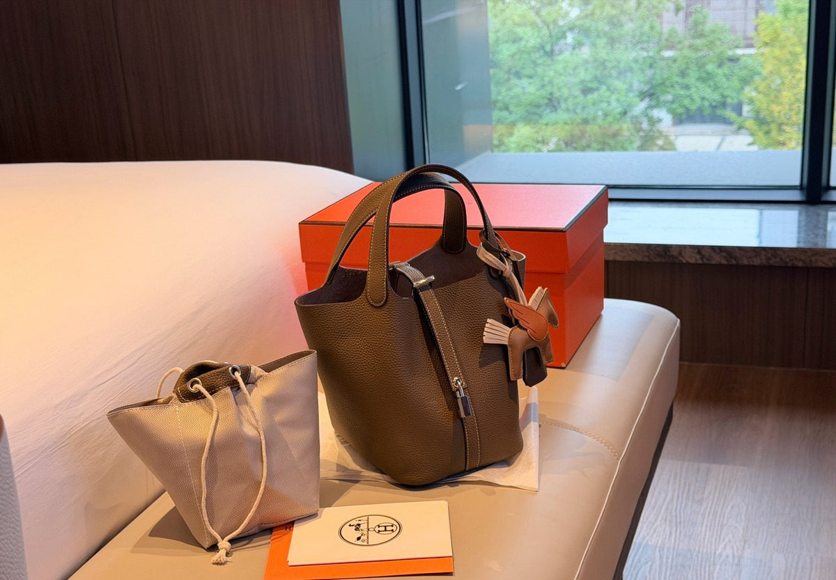 Hermès Curved-Panel Top-Handle Bucket Bag — front