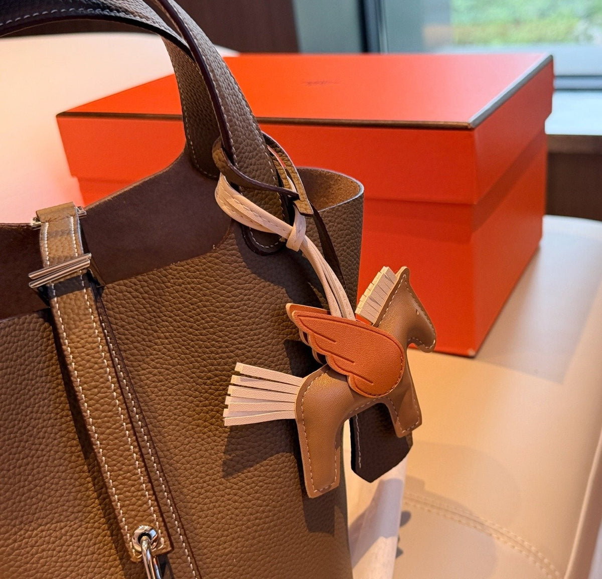 Hermès Curved-Panel Top-Handle Bucket Bag — detail