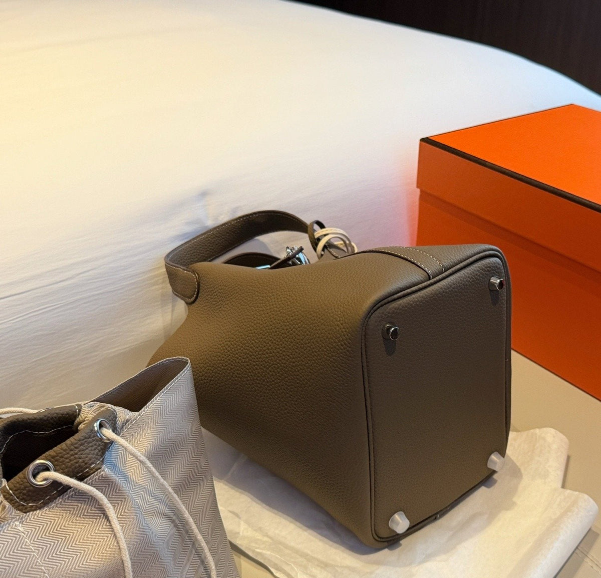 Hermès Curved-Panel Top-Handle Bucket Bag — detail