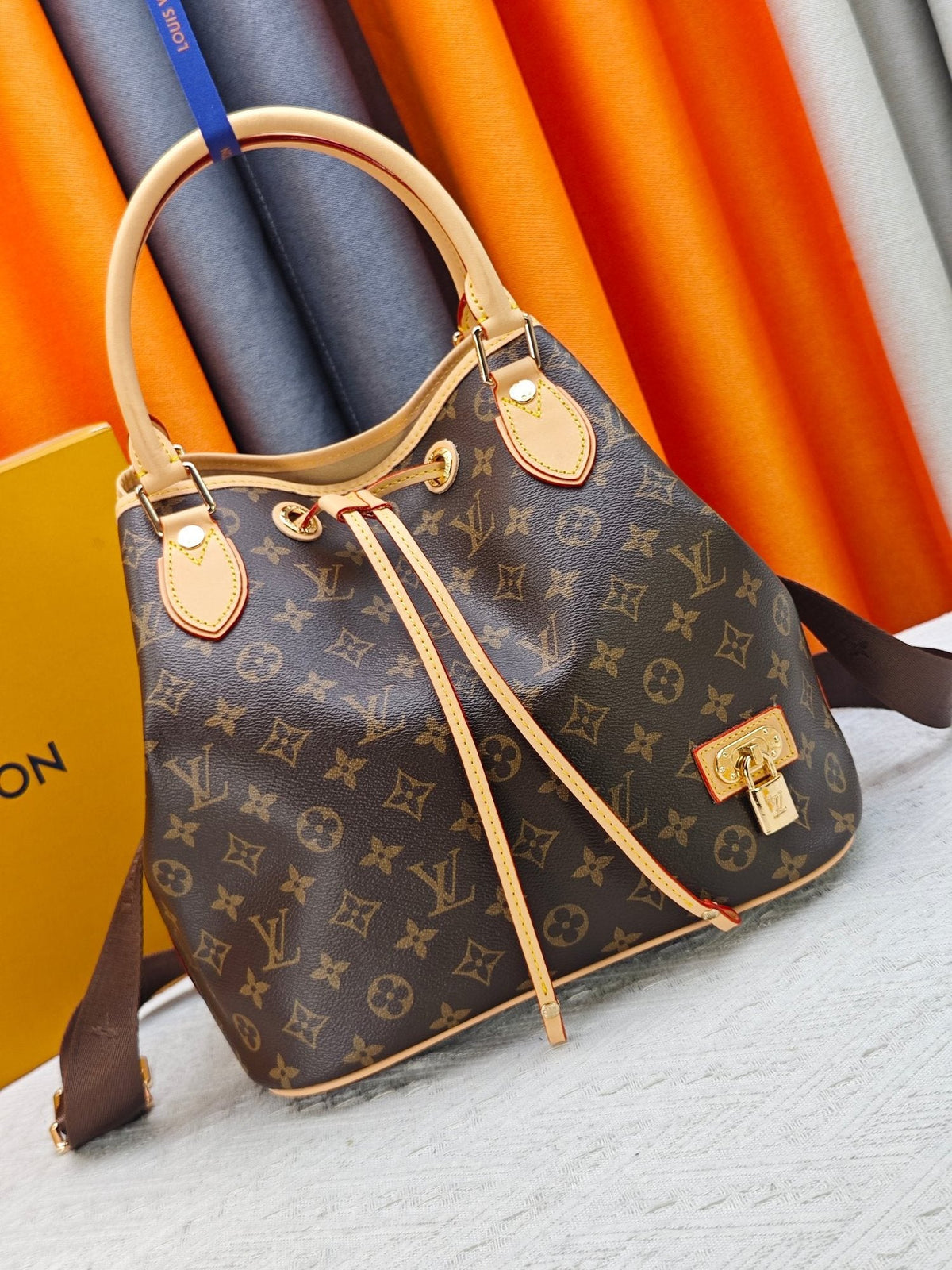 Louis Vuitton NEO Monogram Drawstring Bucket Bag — hero