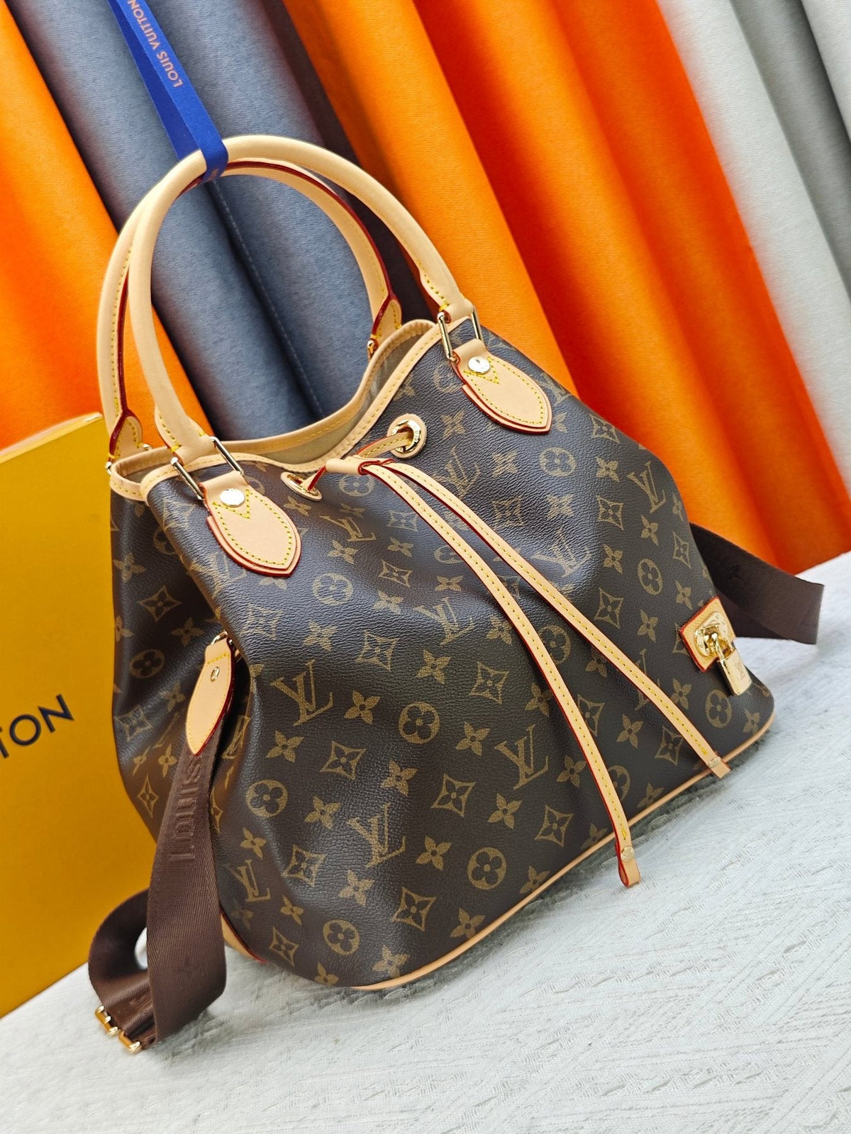 Louis Vuitton NEO Monogram Drawstring Bucket Bag — front