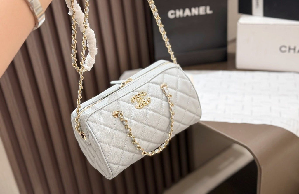 Chanel Quilted Bowling Bag with Jeweled CC Emblem — front