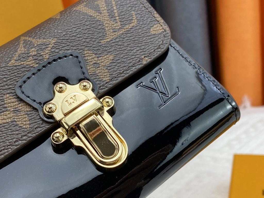 Louis Vuitton Monogram Trunk-Clasp Compact Wallet — detail