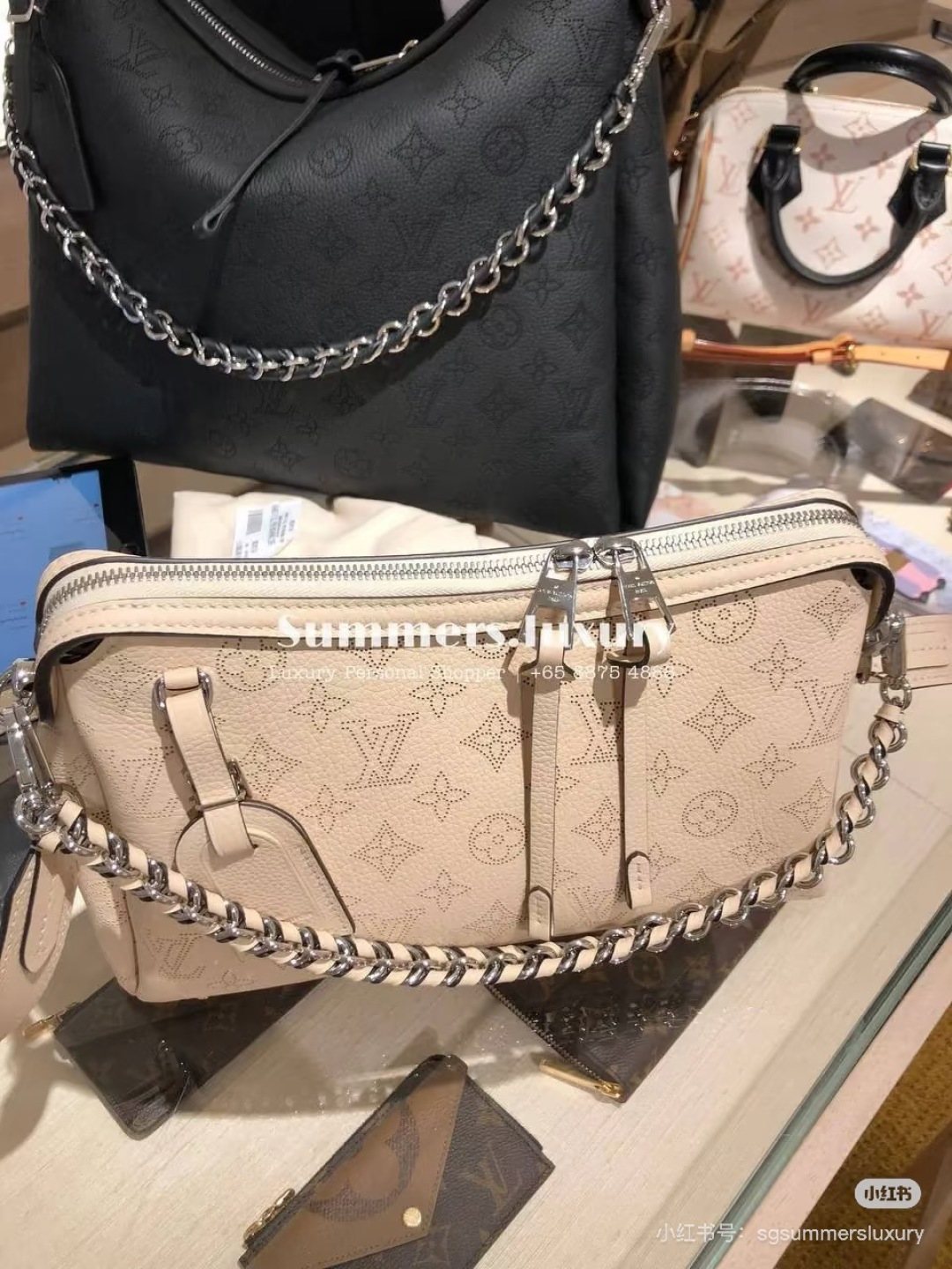 Louis Vuitton Mahina Chain-Detail Shoulder Bag — comparison