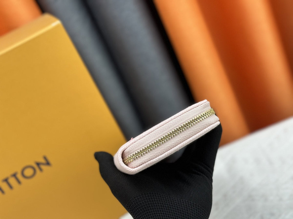 Louis Vuitton Zippy Monogram Denim Wallet — side