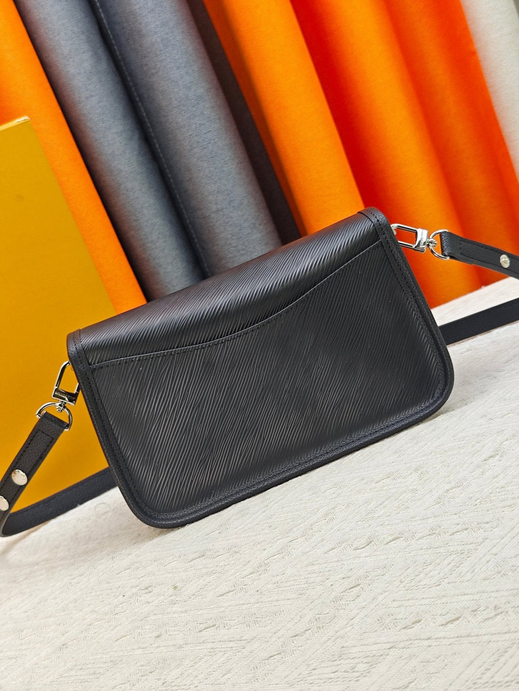 Louis Vuitton Textured Flap Shoulder Bag — back