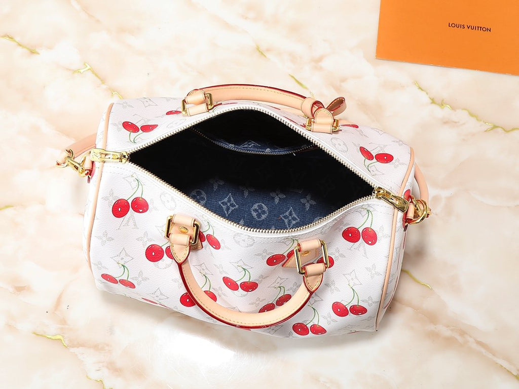 Louis Vuitton Speedy Soft Monogram Top-Handle Bag — detail