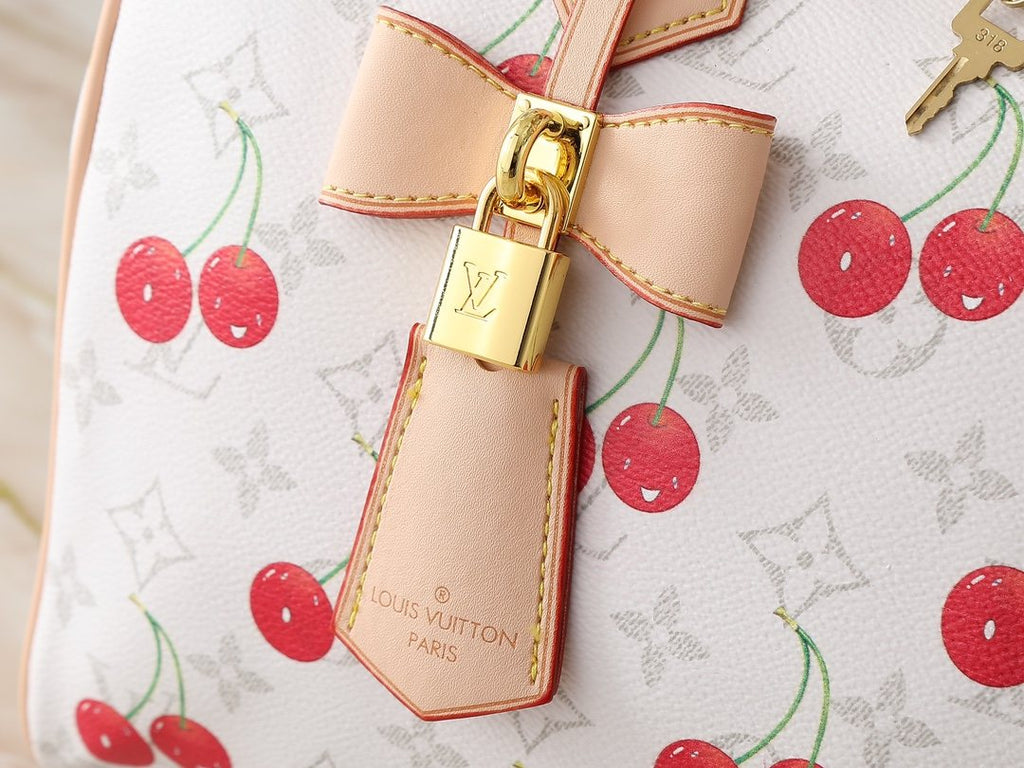 Louis Vuitton Speedy Soft Monogram Top-Handle Bag — detail