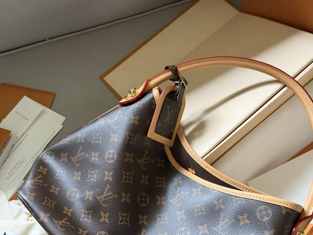Louis Vuitton Carryall Monogram Shoulder Bag — detail