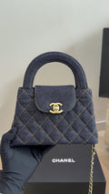 Chanel Kelly Quilted Denim Top-Handle Bag — hero