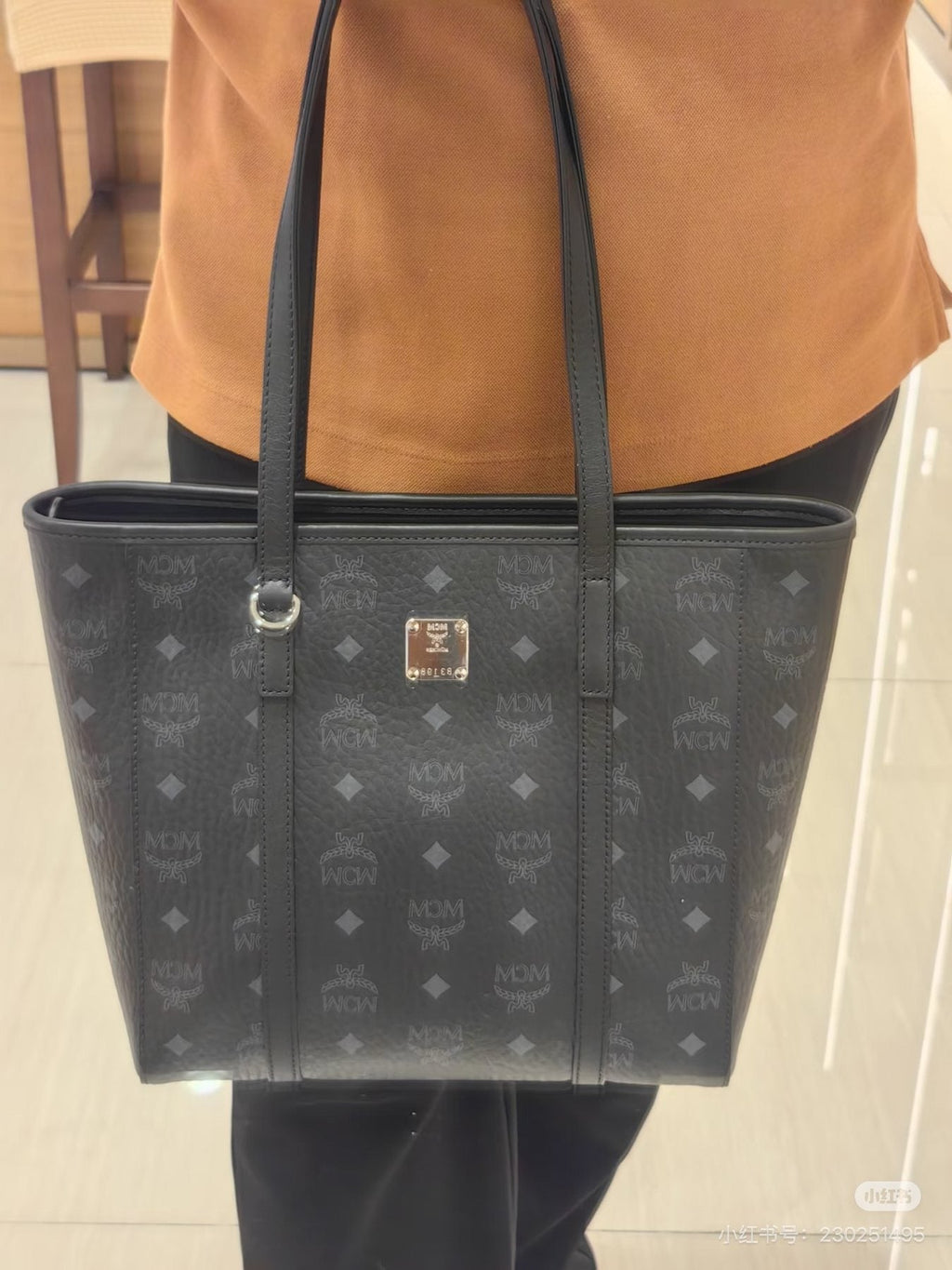 MCM Monogram Zip-Top Tote with Animal Charm — model
