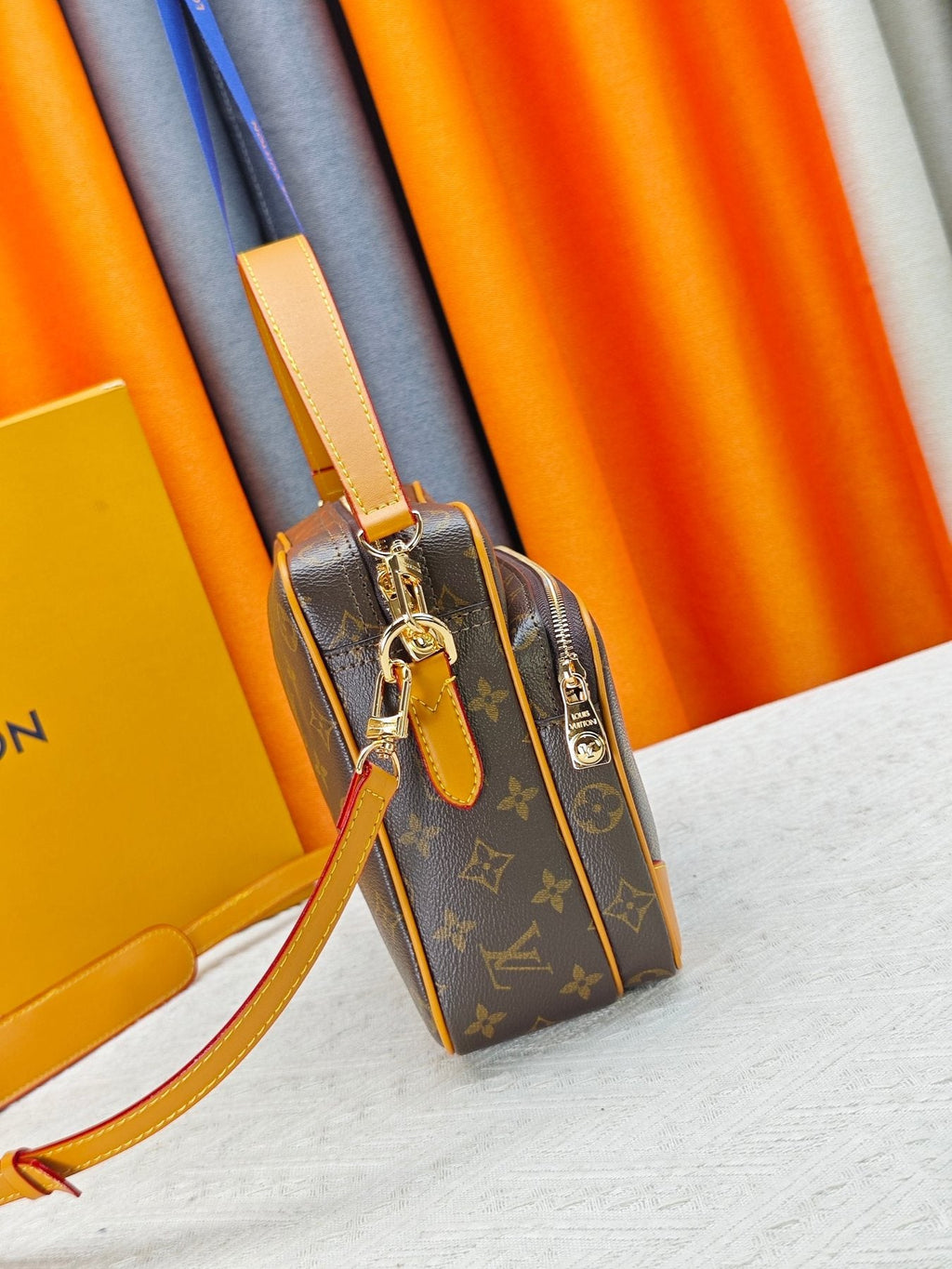 Louis Vuitton Nil Monogram Crossbody Bag — side