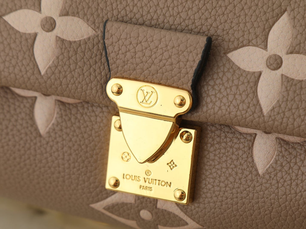 Louis Vuitton Favorite Monogram Empreinte Shoulder Bag — detail