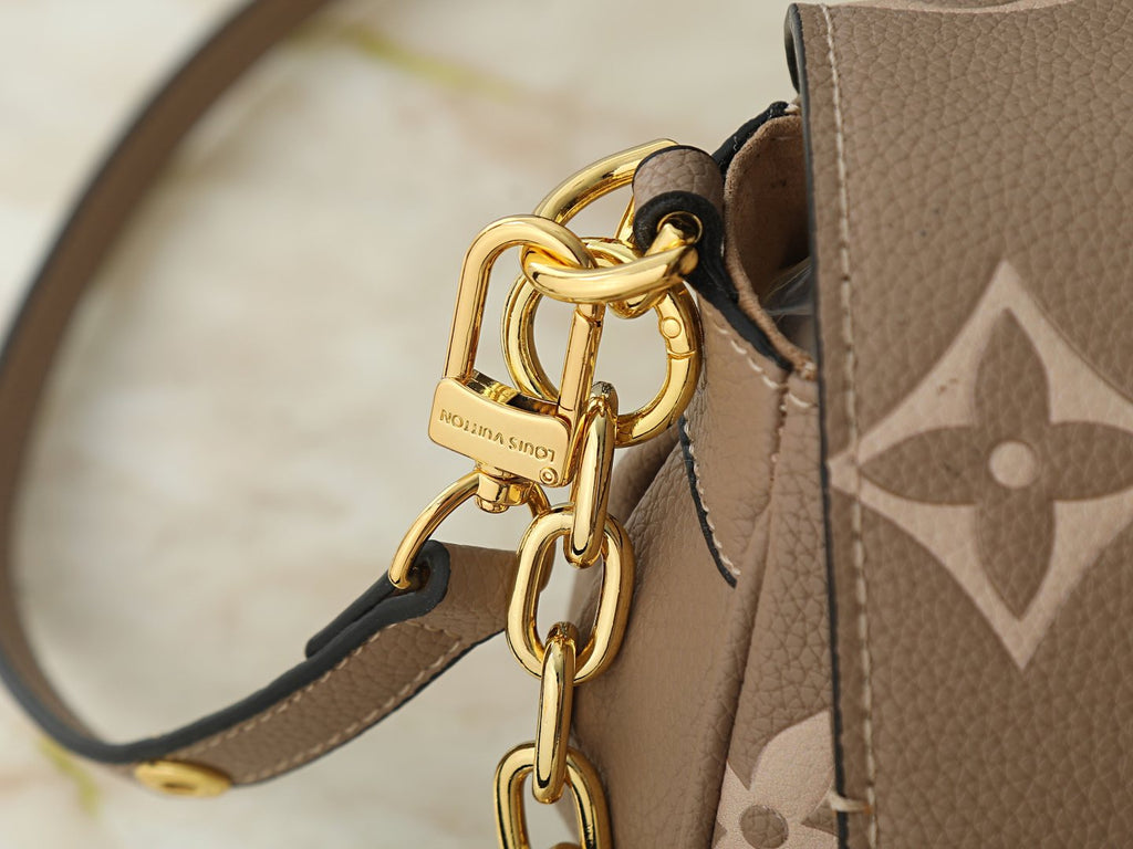 Louis Vuitton Favorite Monogram Empreinte Shoulder Bag — detail