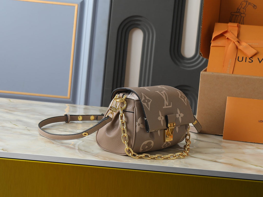 Louis Vuitton Favorite Monogram Empreinte Shoulder Bag — side