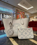 Louis Vuitton Flared Printed Tote with Round Pouch — front