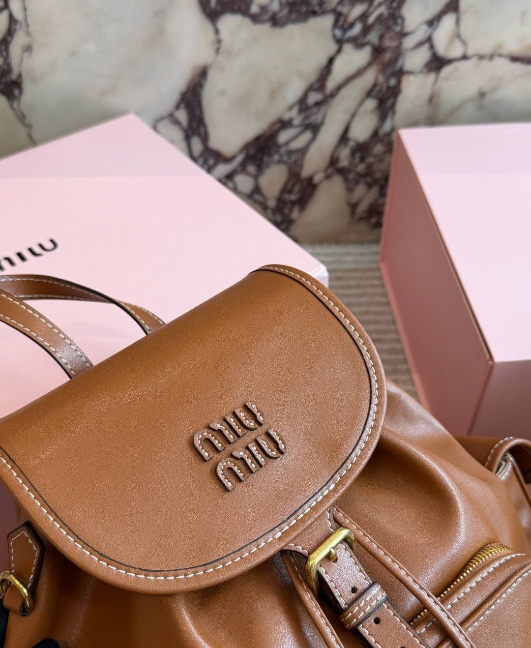 Miu Miu Buckled Flap Backpack — detail