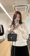 Chanel Quilted Top-Handle Flap Bag — hero