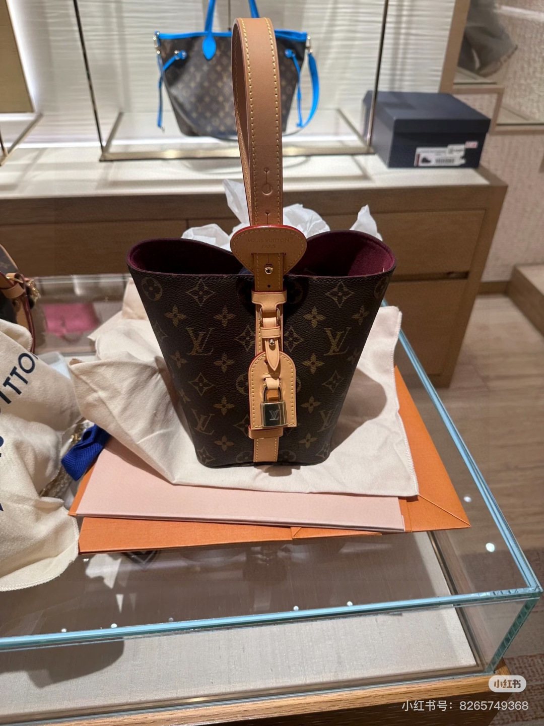 Louis Vuitton Monogram Buckle-Strap Bucket Bag — hero