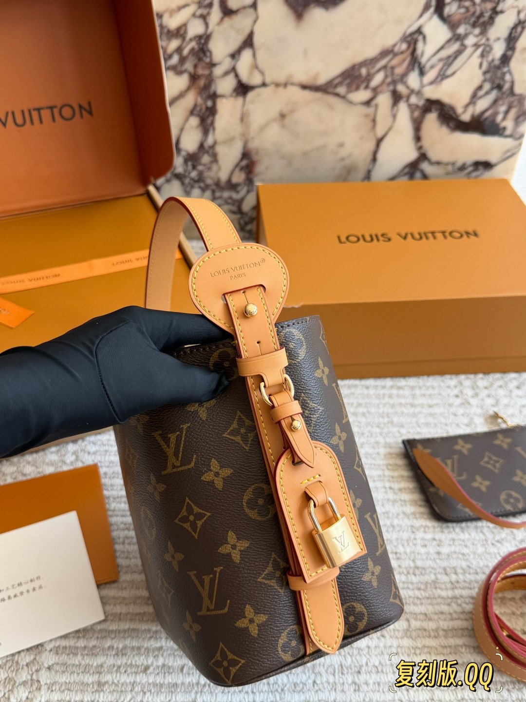 Louis Vuitton Monogram Buckle-Strap Bucket Bag — side