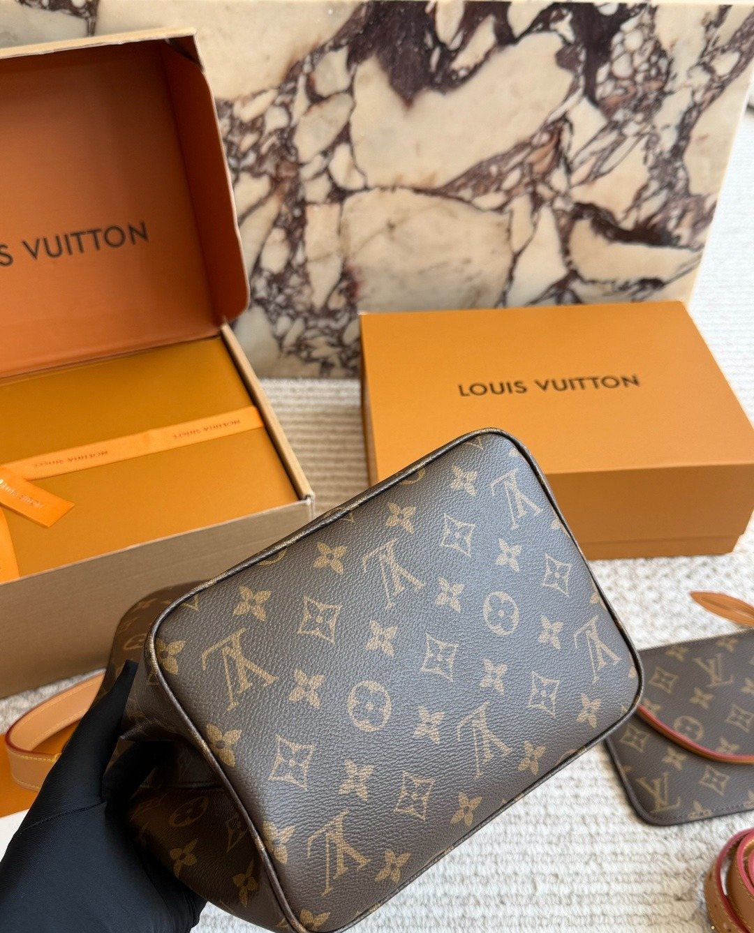 Louis Vuitton Monogram Buckle-Strap Bucket Bag — detail