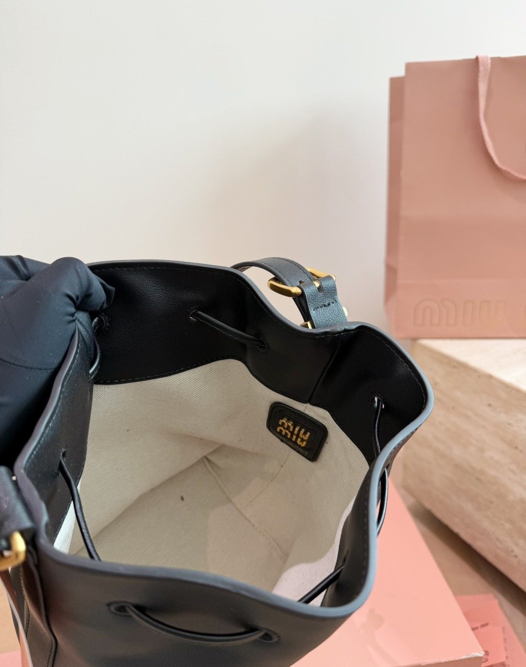 Miu Miu Smooth Leather Drawstring Bucket Bag — detail