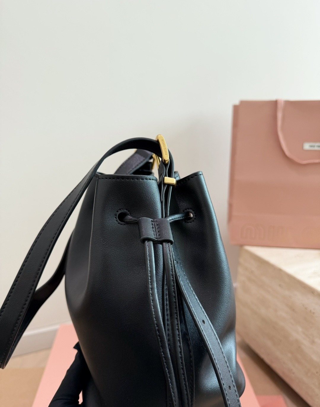 Miu Miu Smooth Leather Drawstring Bucket Bag — side