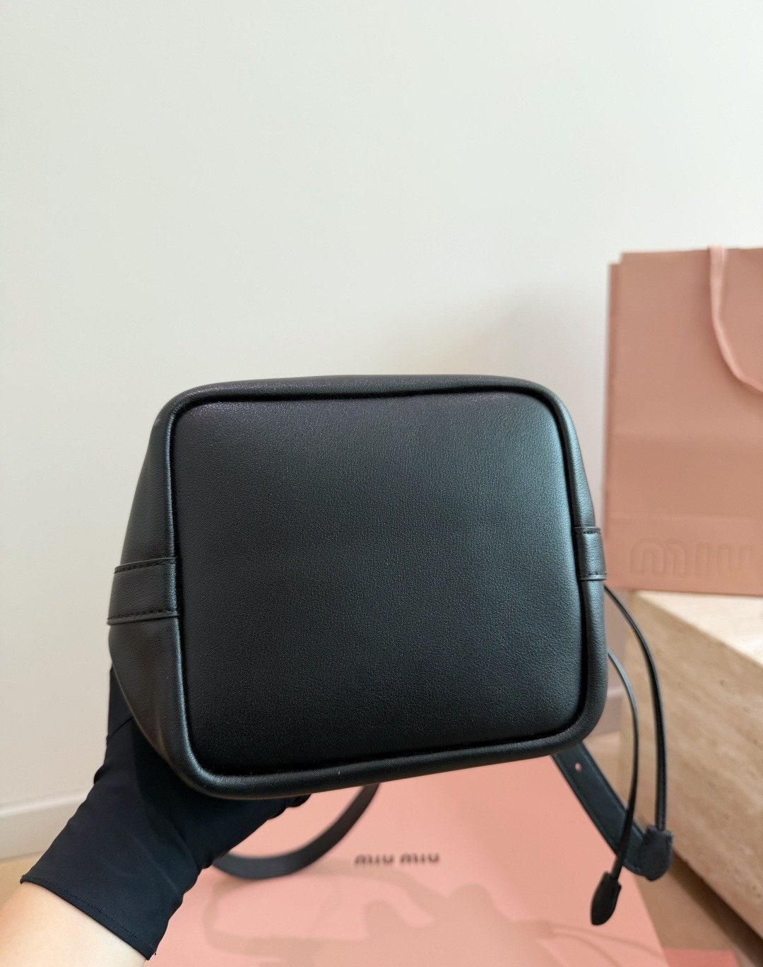 Miu Miu Smooth Leather Drawstring Bucket Bag — detail