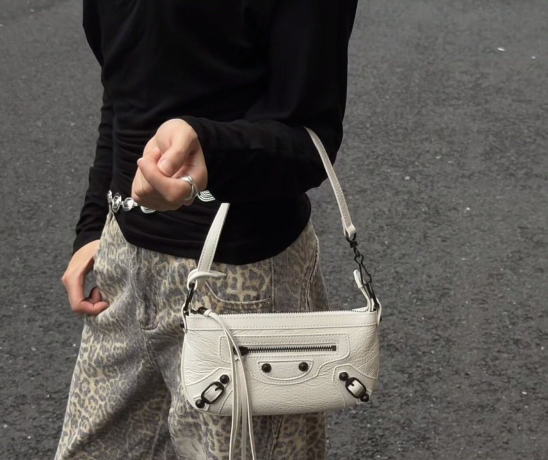 Balenciaga Studded Shoulder Bag with Long Zipper Ties — model