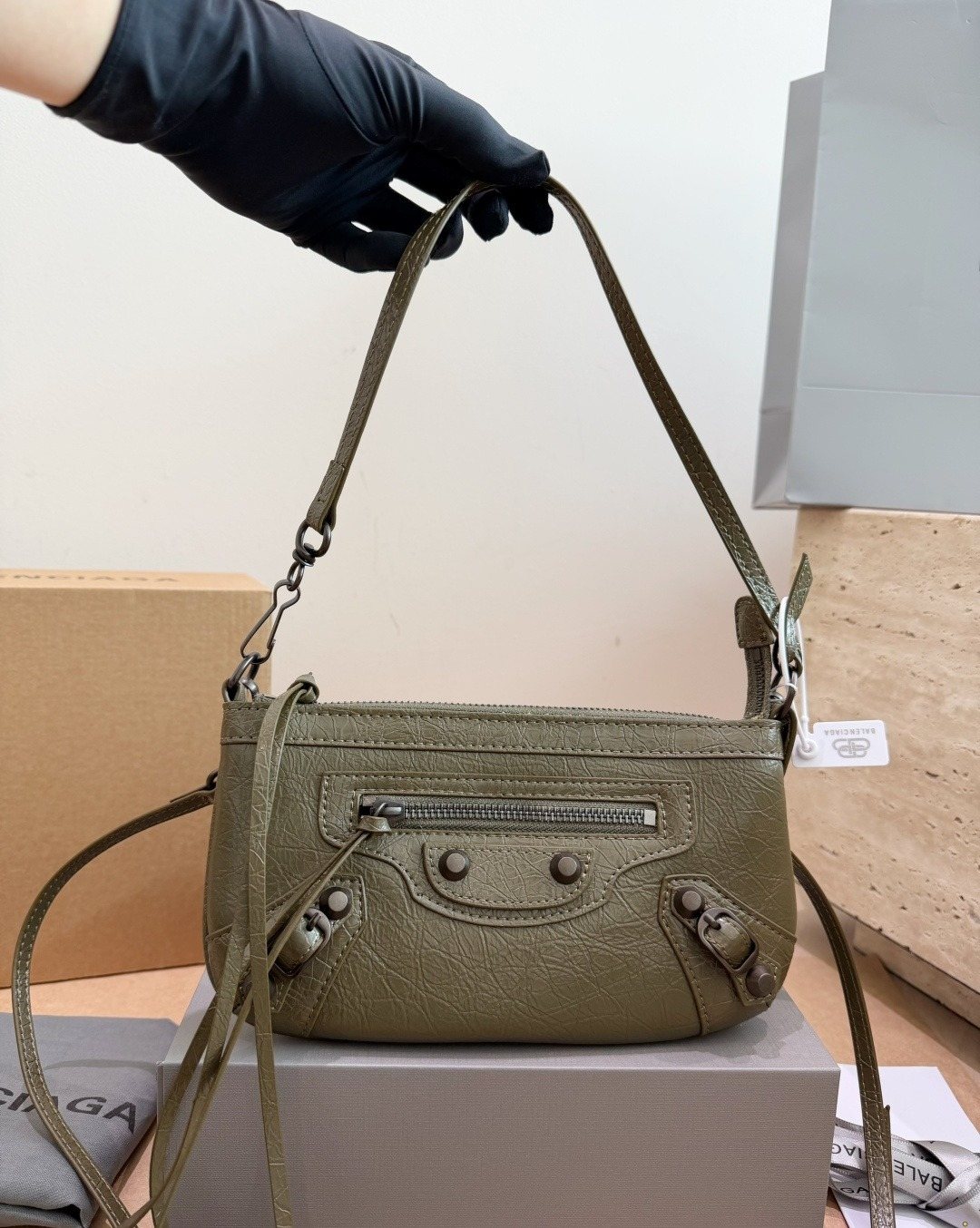 Balenciaga Studded Shoulder Bag with Long Zipper Ties — model
